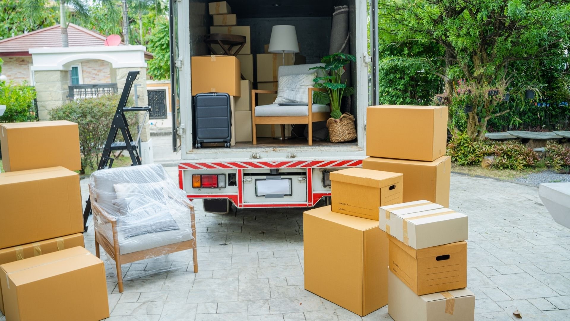 MovePlus team preparing boxes and belongings for a move